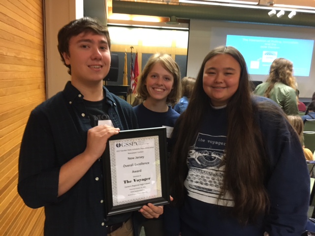 Editors-in-Chief, Alex Mackle and Hayley Beluch (center) with Managing Editor Julia Dodd hold award after ceremony at Rutgers. 