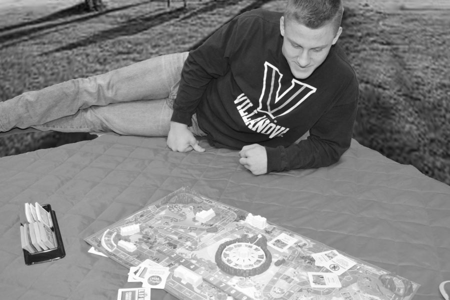 Wearing his Villanova sweatshirt, junior TJ Franden plays The Game of Life