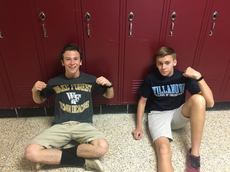 Vincent Melara and Matthew Rossignol sit by the lockers.