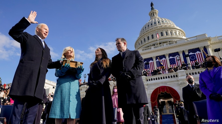Joe Biden officially gets sworn into office as the 46th President of the United States in front of the Capitol.