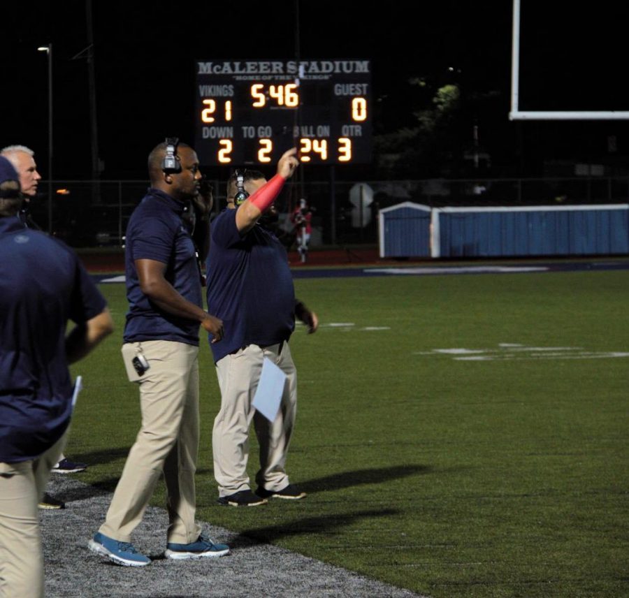 Coach Bolen (left) and Coach Yotsko (right) communicate with the team during the third quarter of their blowout victory against Trenton Central on September 17th, 2021 at McAleer Stadium.