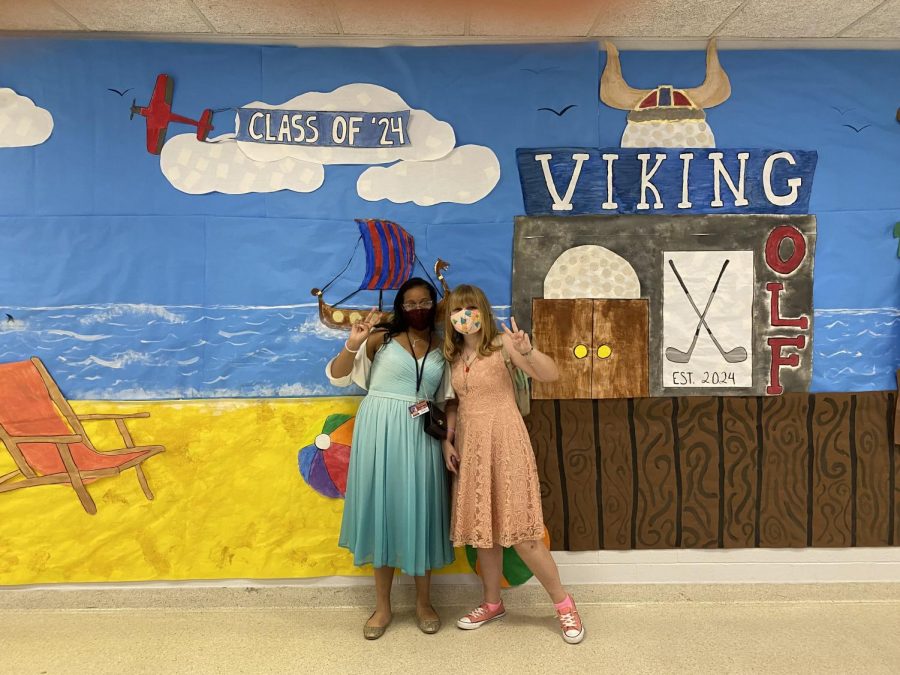 Sophomores Kaitlin Swift and Leilani Johnson stand in front of the Sophomore Spirit Wall
