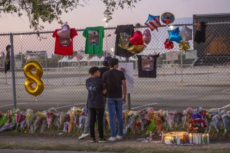 People mourning the lost of those lost at the Astroworld concert. 