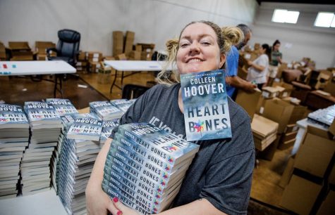 Colleen Hoover packing orders for one of her hit-books, Heart Bones!